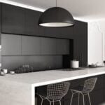 A person who chooses minimalistic style by not decorating their home with any furnishings or adornments