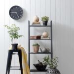 How did the ancient Romans decorate their homes with mosaics, frescoes, and luxurious furnishings