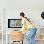 Techniques for blending gray and tan in home decor to create a cohesive and modern look