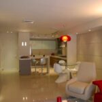 Step-by-step guide on how to decorate home for housewarming, including color scheme and furniture arrangement