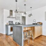 What People Do to Decorate for an Urn in Home Creative arrangements of flowers and candles to decorate for an urn in home