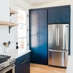 How to decorate a rustic fireplace mantel in a log home with natural elements and cozy accents