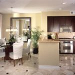 Classic British Colonial home decor featuring rich woods, British-inspired prints, and colonial-era artifacts