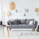 Handmade paper mache Ganesha idol with fresh flower garland